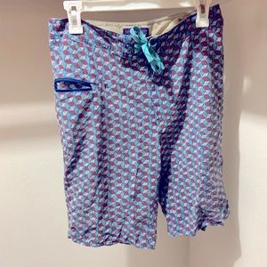 Patterned swim trunks.